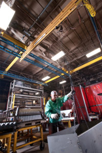 Worker using crane